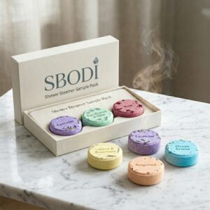 Shower Steamer Sample Pack by Sbodi with premium aromatic steamers on white background
